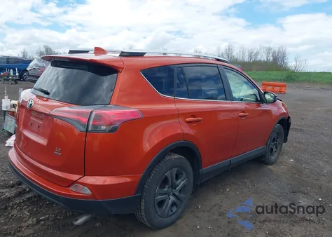 2016 Toyota Rav4 Le z USA, uszkodzony, nr VIN JTMBFREVXGJ092836